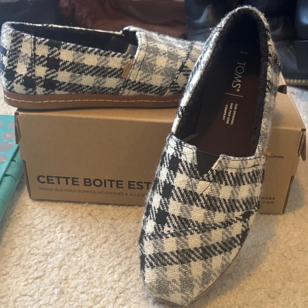 TOMS Checkered Black and White Slip-Ons